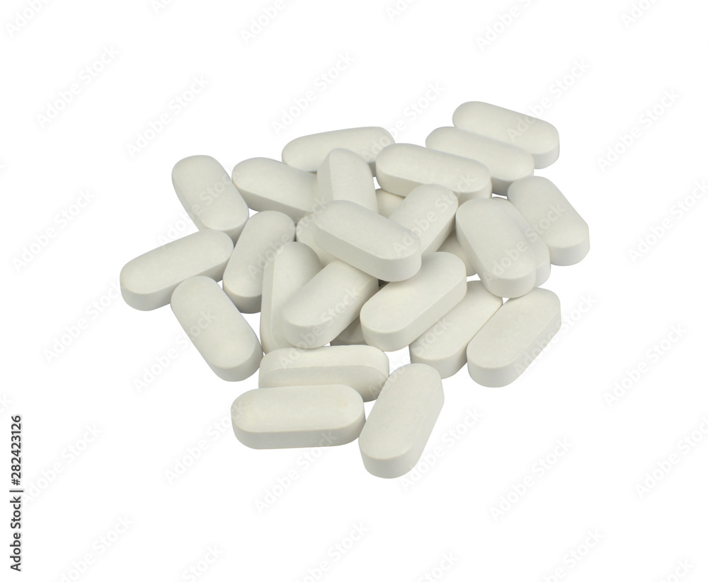 Pile of white pills – isolated on white background Pile of white pills – isolated on white background