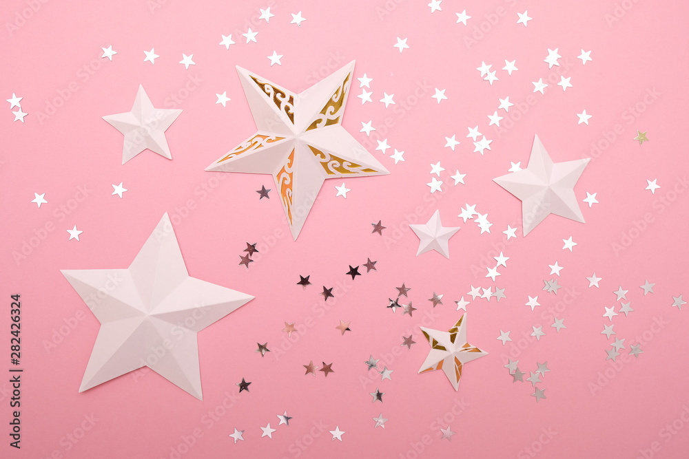 Stars cut from paper with sequins in the star shape Stars cut from paper with sequins in the star shape