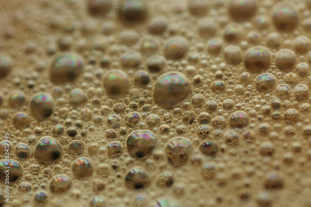 close up of hot espresso, black coffee or chocolate with bubble, shallow depth of field