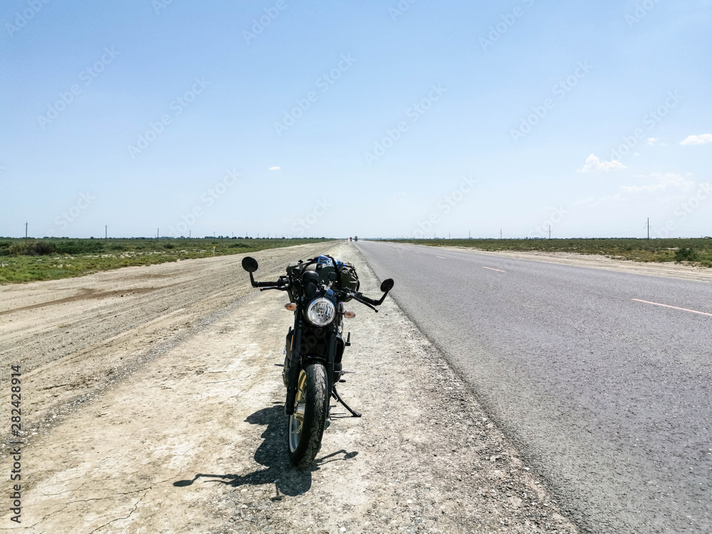 Obraz premium Moto travel on retro cafe racer motorcycle
