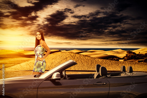 Slim young woman and summer car 