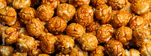 sweet Caramel Cream popcorn on the black background