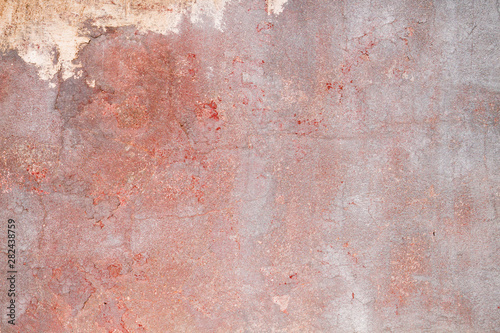 Old weathered red wall background or texture