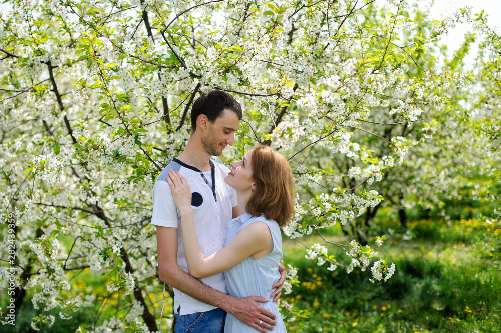Young couple in the garden