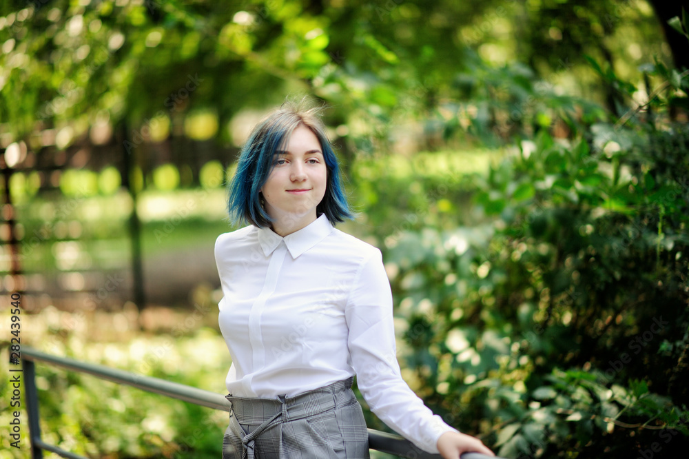 teenage girl in white blouse in green summer park teenage girl in white blouse in green summer park