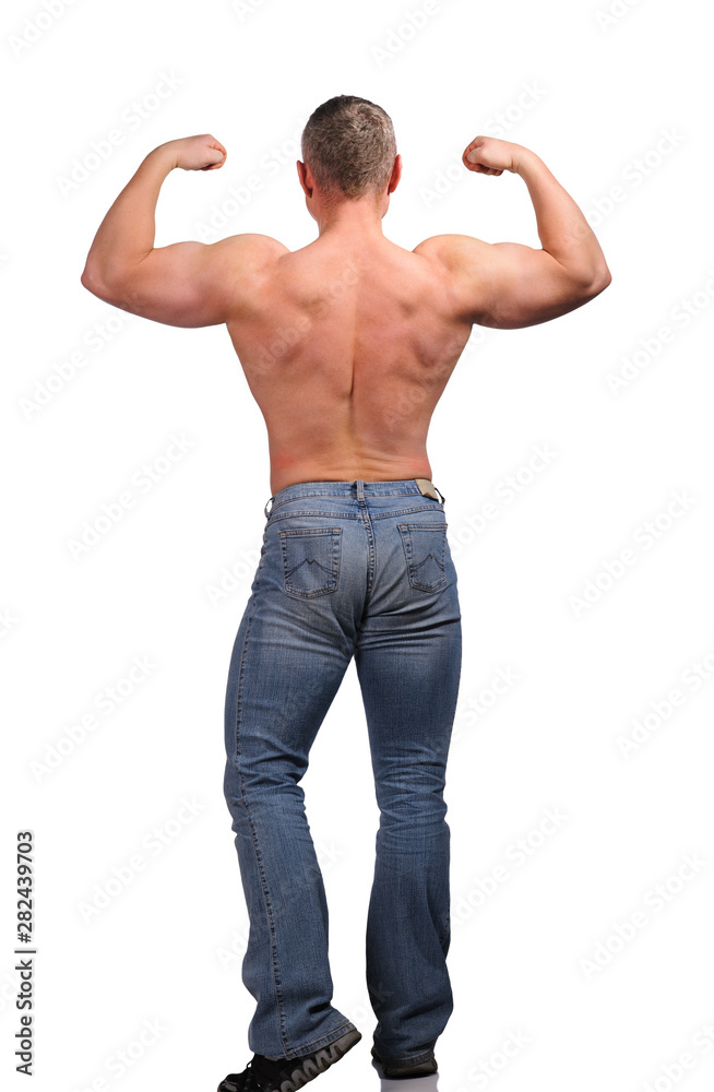 Fototapeta premium Image of muscle man posing in studio