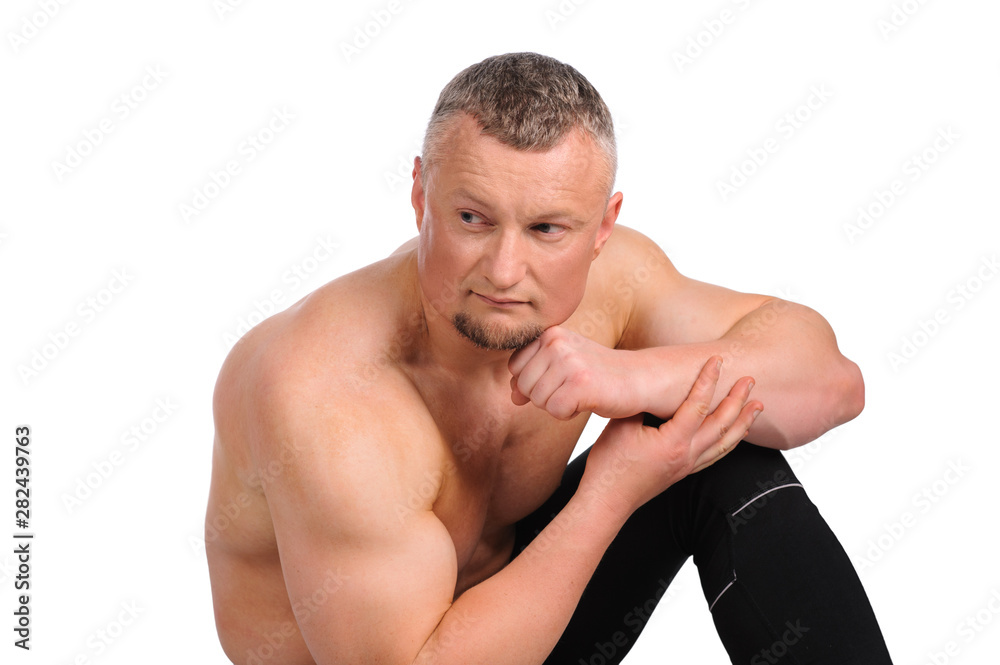 Image of muscle man posing in studio Image of muscle man posing in studio
