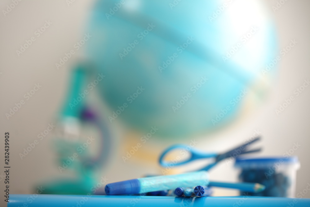 Concert education globe books microscope and pencils on background. Concert education globe books microscope and pencils on background.