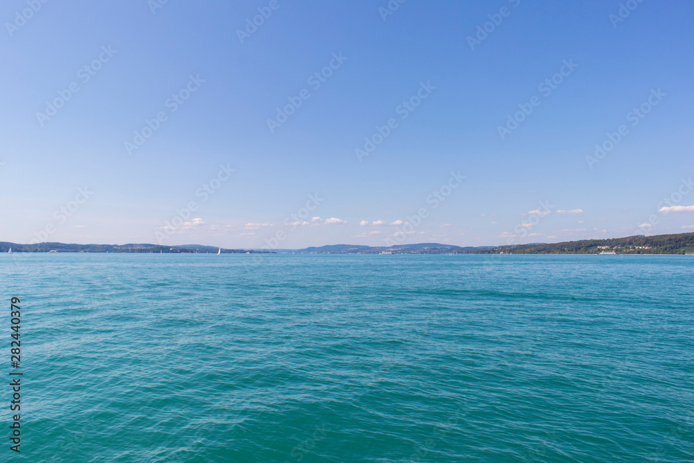 Panoramic view at lake Bodensee during summer time Panoramic view at lake Bodensee during summer time