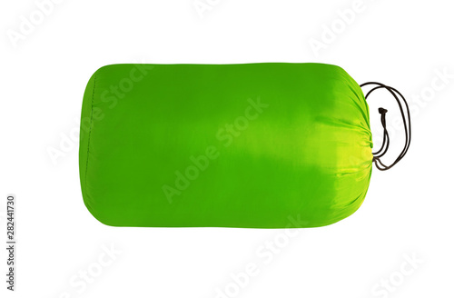 Sleeping bag packed in case and isolated on white background