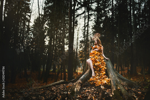 Fototapeta Naklejka Na Ścianę i Meble -  Fashion Autumn model, Fall Leaves Dress, Beauty Girl in kokoshniks