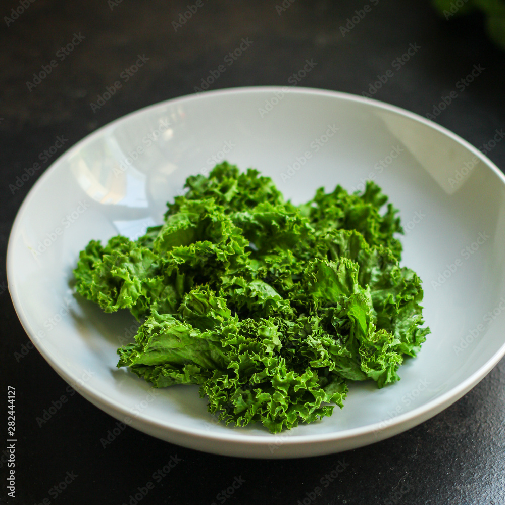 Healthy salad, leaves mix (green juicy snack). top food background - Image Healthy salad, leaves mix (green juicy snack). top food background - Image