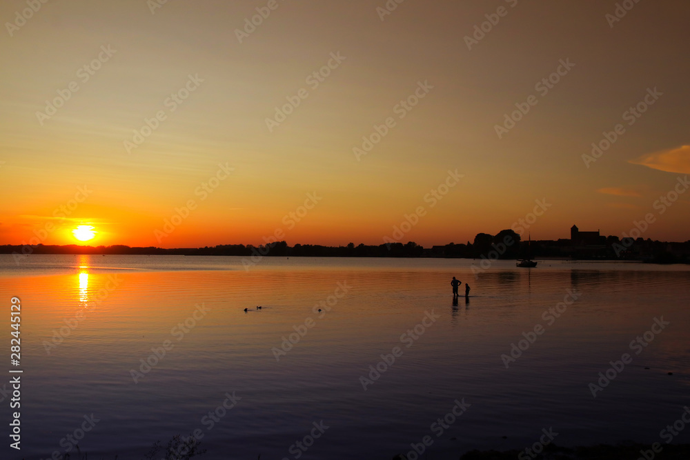 Sunset in Waren (with skyline) on Müritz lake, Mecklenburg Lake Plateau, 