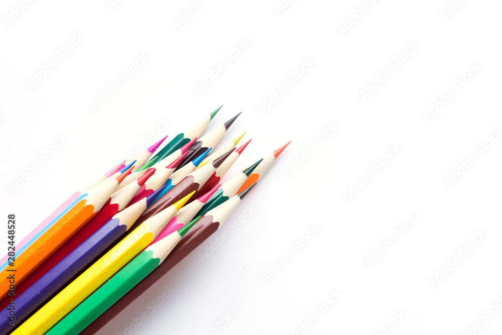 Set of school color pencils isolated on white background. Top view, flat lay composition, frame, layout. Copy space for text or design. Set of school color pencils isolated on white background. Top view, flat lay composition, frame, layout. Copy space for text or design.