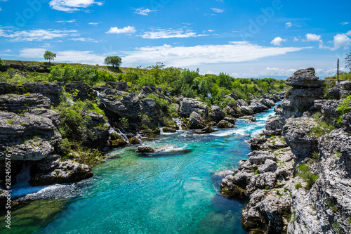 Montenegro, Perfect clean crystal clear water of cijevna river in podgorica nature landscape near niagara falls on sunny day