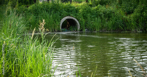 Pipe or tube for water sewer leading into the river.