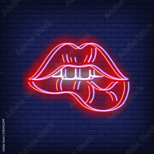 Woman lips biting neon sign with chromatic aberration effect