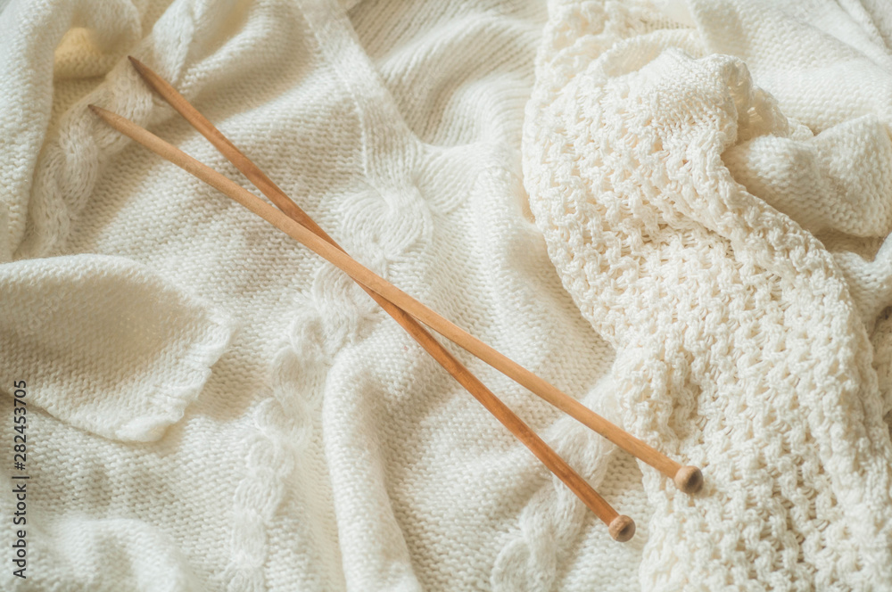 Thread for knitting in a basket closeup. Knitting as a hobby. Accessories for knitting. Thread for knitting in a basket closeup. Knitting as a hobby. Accessories for knitting.