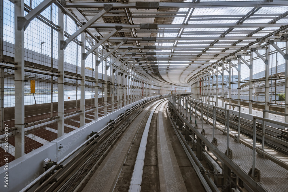 tunnel of monorail road view from front window of a moving train running