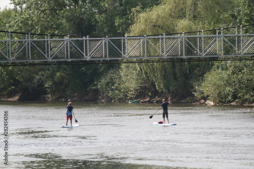 paddleboarders on the river