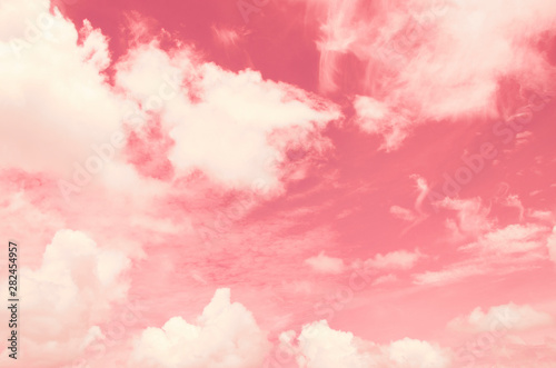 Blurred pink sky and white clouds with blurred pattern background