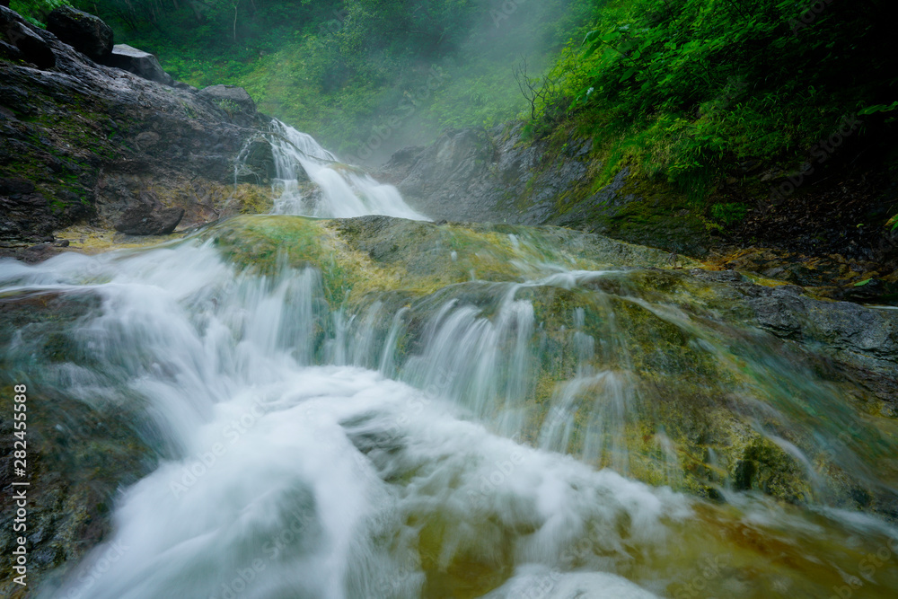 hot spring waterfall in forest hot spring waterfall in forest