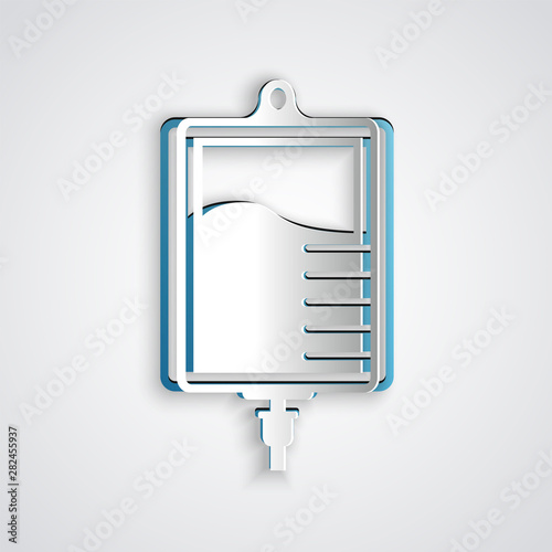 Paper cut IV bag icon isolated on grey background. Blood bag icon. Donate blood concept. The concept of treatment and therapy, chemotherapy. Paper art style. Vector Illustration