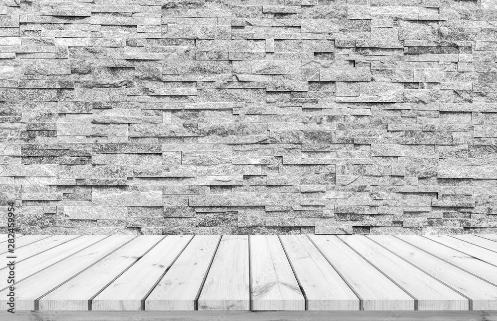 Fototapeta premium wood plank with abstract stone brick wall background for product display