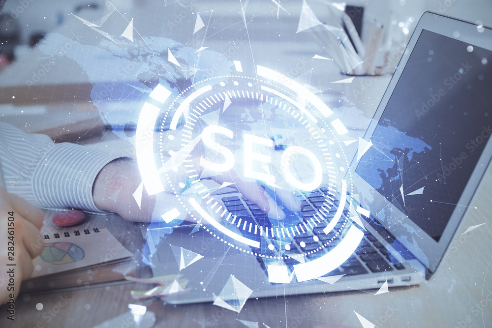Double exposure of seo icon with man working on computer on background. Concept of search engine optimization. Double exposure of seo icon with man working on computer on background. Concept of search engine optimization.