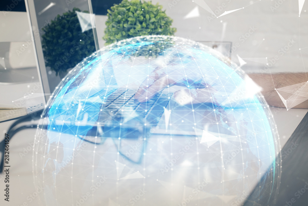 Double exposure of businessman working on laptop on background. International business hologram in front. Concept of success. Double exposure of businessman working on laptop on background. International business hologram in front. Concept of success.