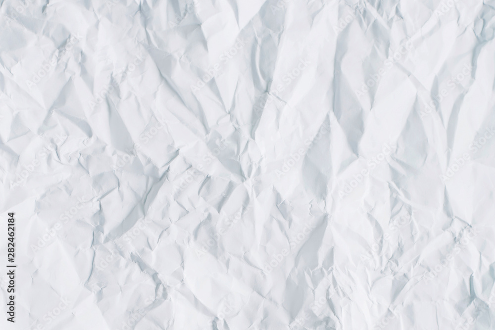 Obraz premium White crumpled paper texture background
