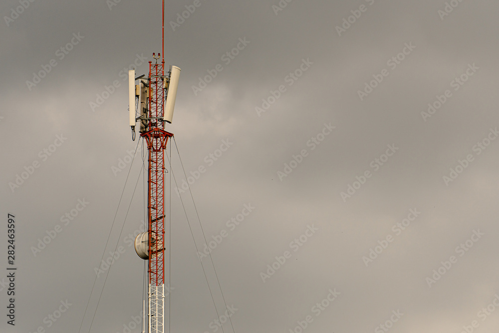 Antennas-digital large bright against the sky Antennas-digital large bright against the sky
