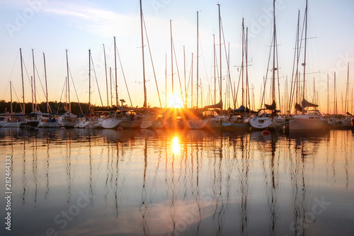 Aland Islands, Finland - View of the embankment with yachts on the Aland Islands. Coast of the Baltic Sea. Beatiful sunset.