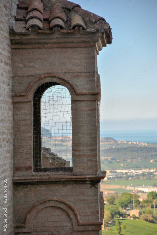 Obraz premium a view of the sea from the top of a house tower