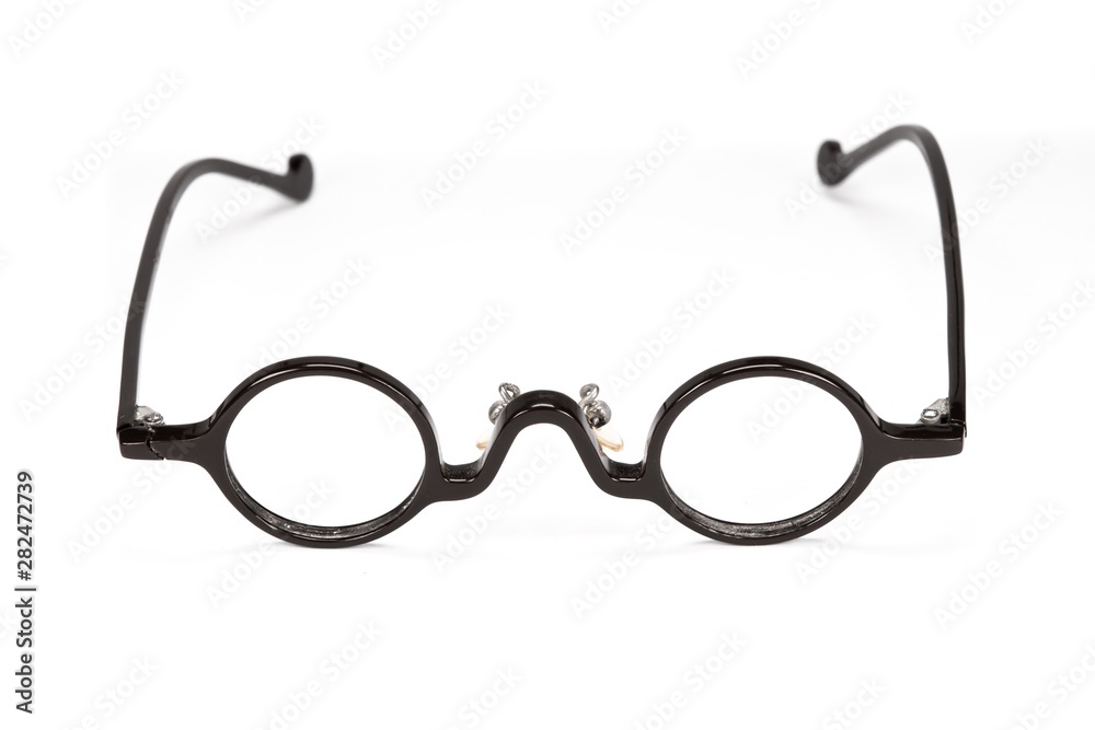 Fototapeta premium Vintage round glasses isolated on white background.