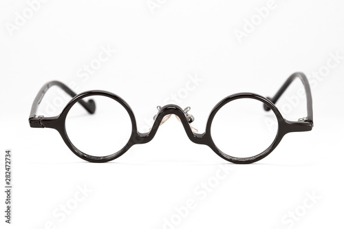 Vintage round glasses isolated on white background.