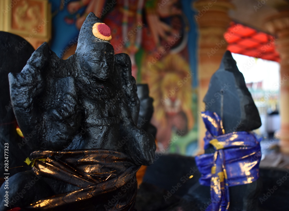 Traditional Hindu god statue in a temple