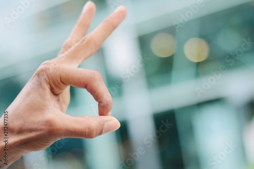 Closeup from beautiful handsigns outside photo