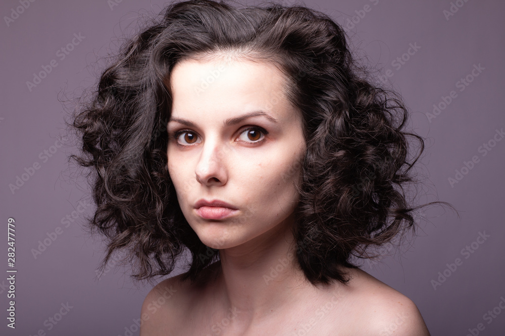Naklejka premium beautiful young curly girl portrai