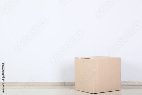 Cardboard box on grey background