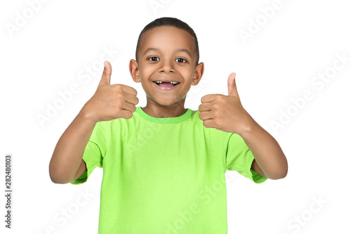 Obraz na płótnie Cute american boy showing thumb up on white background w salonie