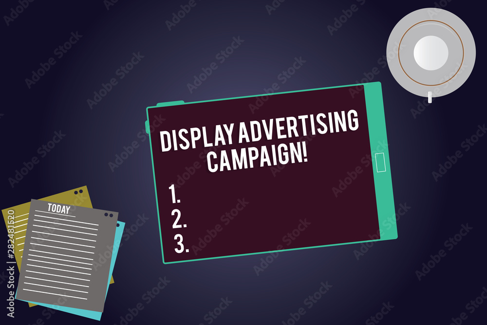 Writing note showing Display Advertising Campaign. Business photo showcasing conveys a commercial message using graphics Tablet Screen Cup Saucer and Filler Sheets on Color Background Writing note showing Display Advertising Campaign. Business photo showcasing conveys a commercial message using graphics Tablet Screen Cup Saucer and Filler Sheets on Color Background