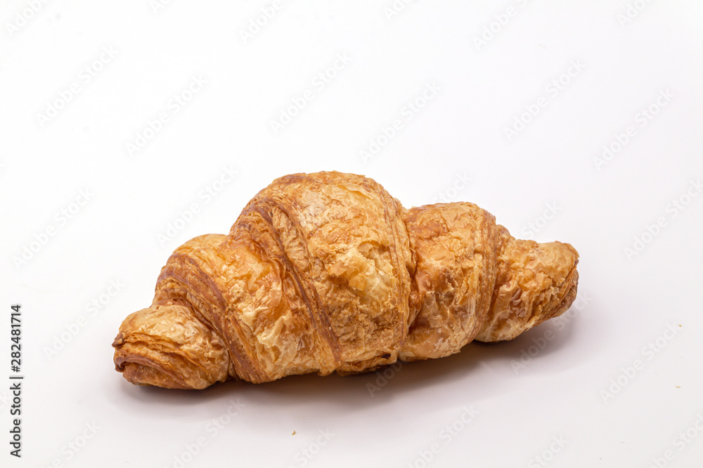 Fresh and tasty buttery croissants isolate on white background. Fresh and tasty buttery croissants isolate on white background.