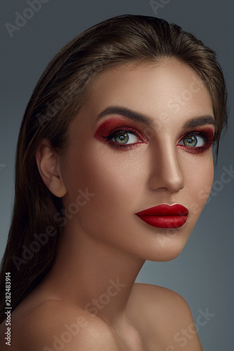 Close-up portrait of a beautiful fashion model with professional make-up.