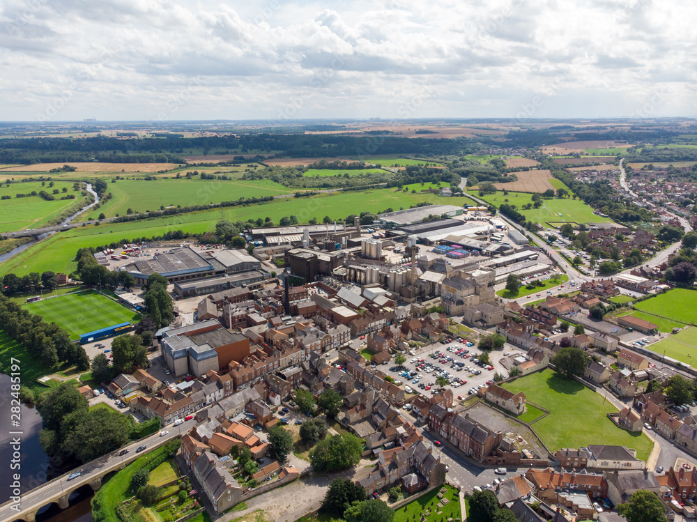 Aerial photo of the the historic town of Tadcaster located in West Yorkshire in the UK, taken on a bright sunny day