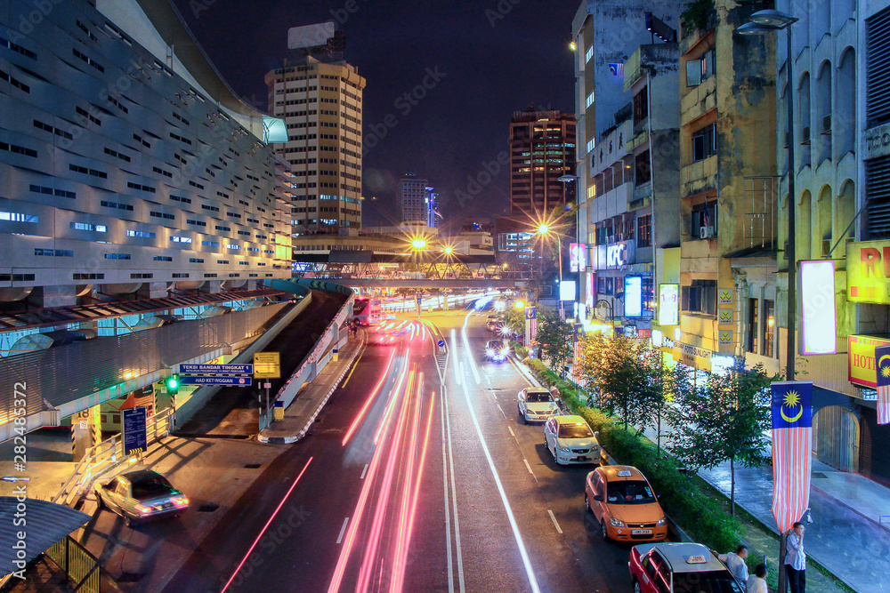 View of Malaysia Night Street with Lighttrail of Business Commercial Area
