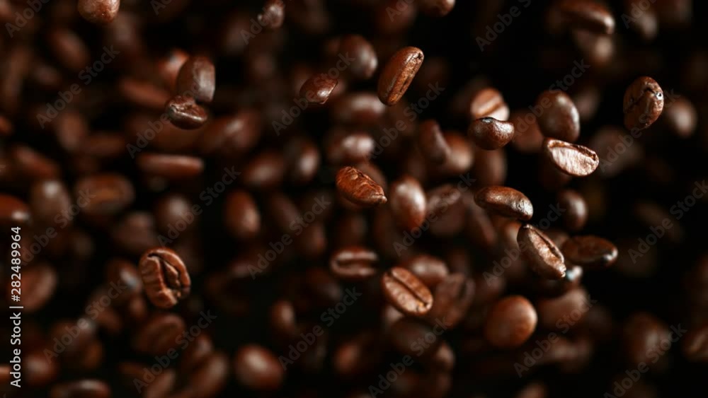 Super slow motion of flying coffee beans. Filmed on high speed cinema camera, 1000 fps. Super slow motion of flying coffee beans. Filmed on high speed cinema camera, 1000 fps.