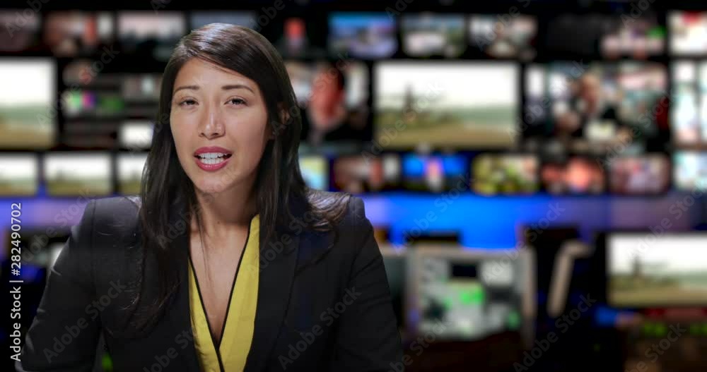 MS Female anchor speaking at news desk