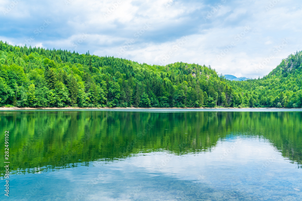 Nussensee lake in Upper Austria located near Bad Ischl in the Salzkammergut - wide panoramic view.