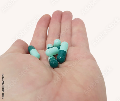 Green capsules isolated